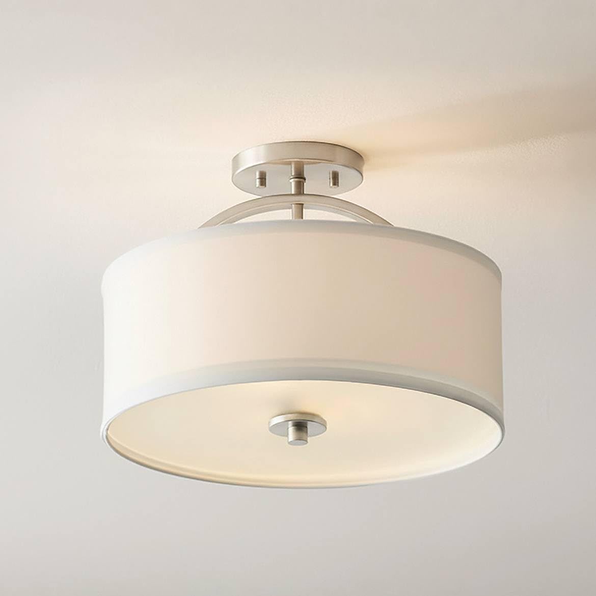 Possini Euro Halsted semi-flush ceiling light with a white linen drum shade and brushed nickel finish.